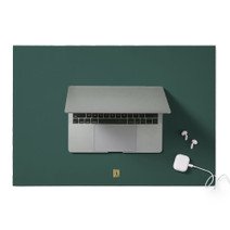 Deep green leather desk blotter with laptop