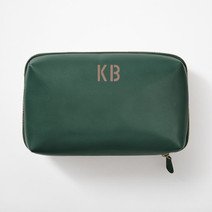 Emerald green leather dopp kit with gold KB monogram